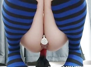 Trans girl in tiny chastity cage rides huge anal dildo