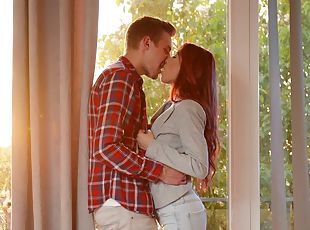 Beautiful redhead has passionate lovemaking session with a hunk