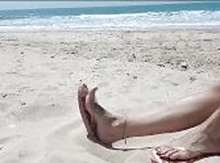 Foot teaser in the beach