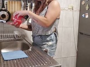 cleans her kitchen with her big tits