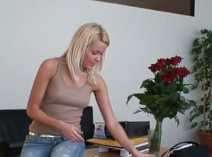 Cheerful Sophie Moone reads a letter in the office