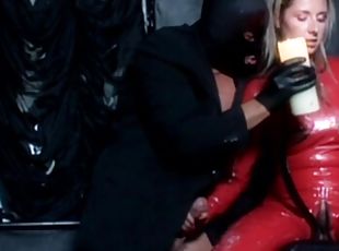 Blonde Diana Doll wearing red latex enjoys while sucking a dick