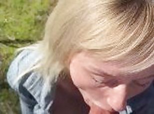 Big tits girl gets a sloppy blowjob from a massive cock in the forest