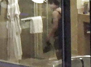 Hotel window voyeur (non-nude) -- woman in lingerie