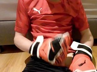 Blond boy jerk off in soccer gear and come on the soccer gear from his boyfriend