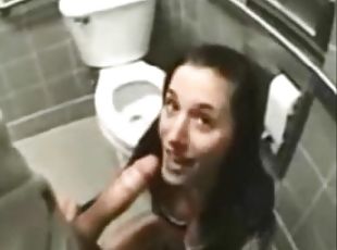 Brunette hussy enjoys ardent upskirt sex in a toilet