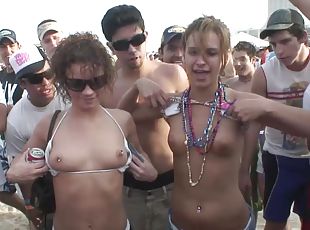 Two girls flash their small boobs after a party on a beach