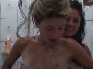 Amateur girls teasing wet bodies in shower