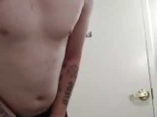 Tattooed guy masturbating/tease.