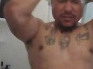 Tattoo hunk caught taking a shower