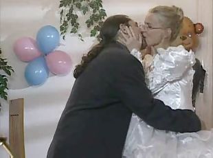 Bride in glasses has cock in her ass