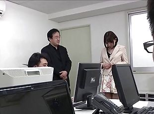 Salacious Japanese office girl enjoys a hot threesome at work