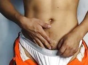 I play with my huge bulge until I moan an orgasm