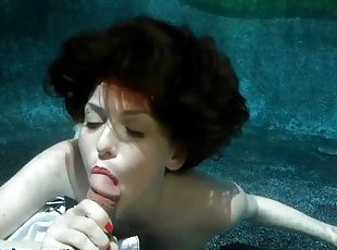 Couple underwater with emma evins