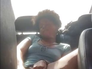 Ebony chick riding a huge dildo in her partners car