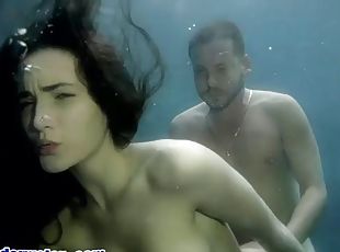 Underwater fun with lovely brunette