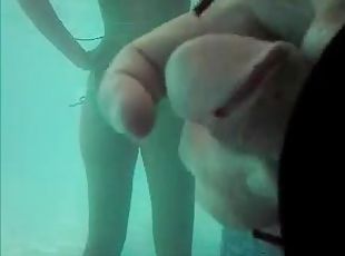 He masturbates under water in public pool