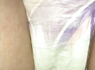 Sexy diaper wetting before we watch a movie