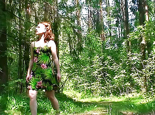 Young beauty in a short dress pees