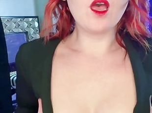 Sexy Redhead teases you with perky tits.
