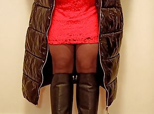 Crossdresser Tranny in Latex coat, and red dress Masturbate. 