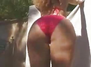 Sexy Latina in bikini shakes her sexy ass for camera