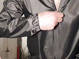 Shiny nylon man in black nylon jacket