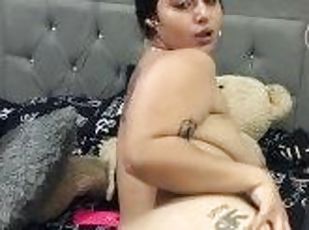 Latina with big tits dances in front of the camera.