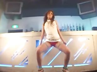 Sexy Asian dances in the bar and looks hot
