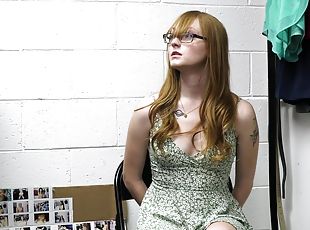 Kinky shoplifter Amber Stark with glasses takes a hard dick in doggy