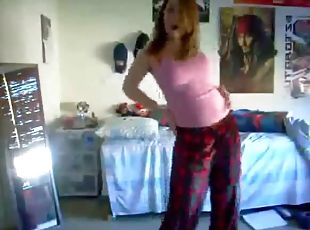 Redhead dances in her pajamas