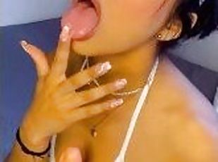 Petite Colombiana sucking a big dildo
